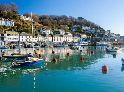a group of boats in the water in a harbor at 2 Bed in Looe oc-l30020 in Looe