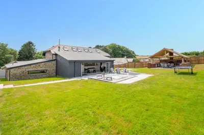 an aerial view of a house with a yard at 4 Bed in Horningtops oc-northt in Menheniot