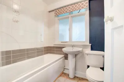 a bathroom with a toilet and a sink and a bath tub at 2 Bed in Newquay oc-p00359 in Mawgan Porth