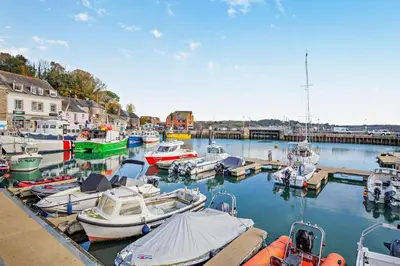 a bunch of boats are docked in a marina at 2 Bed in Wadebridge oc-r27444 in Little Petherick