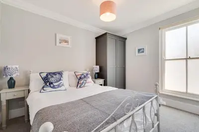 a bedroom with a bed and a window at 2 Bed in St. Ives oc-upper4 in St Ives