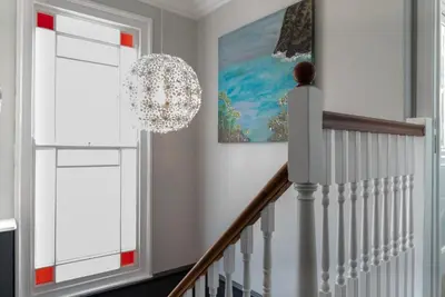 a white staircase with a chandelier in a house at 2 Bed in St. Ives oc-upper4 in St Ives