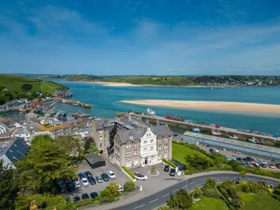 an aerial view of a town next to a body of water at Harbour Hotel Padstow in Padstow