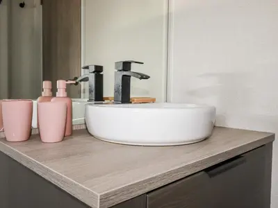 a bathroom sink sitting on top of a counter at 63 The Maples in St Austell