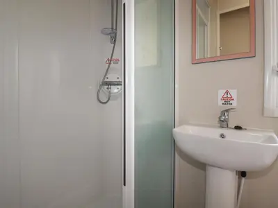 a bathroom with a shower and a sink at Chez Nous in Newquay