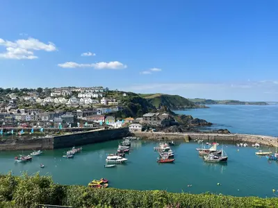 a group of boats in the water in a harbor at Apartment Rock Pools by Interhome in Mevagissey