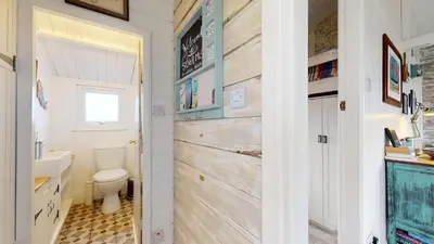 a bathroom with a toilet and a sink at E41 Silver Mist, Riviere Towans in Hayle