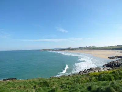 a view of the beach from a bluff at Wildwood in Newquay