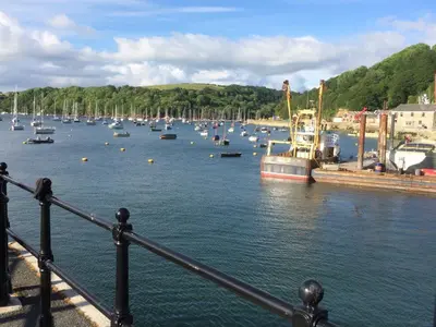 a bunch of boats are docked in a harbor at 3 Bed in Polruan oc-pc012 in Polruan