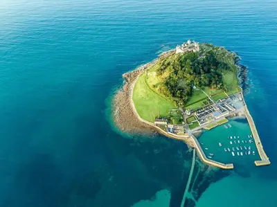 an island in the water with a castle on it at 4 Bed in Helston oc-90391 in Crowan