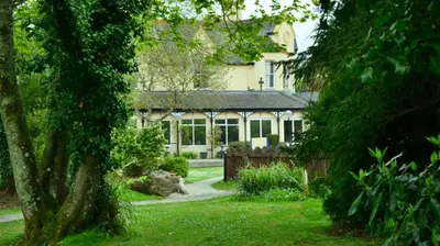 a house with a garden in front of it at 46 Strawberry Hill, Tolroy Manor in Hayle