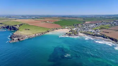 an aerial view of a beach and the ocean at 2 Bed in Padstow oc-t29016 in Padstow