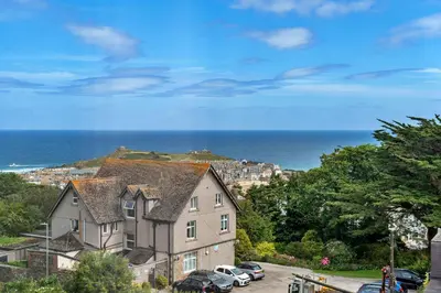 a house with a view of the ocean at Finest Retreats - No 11 Porthminster in St Ives