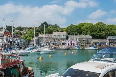 a group of boats docked in a harbor at 3 Bed in St. Ervan oc-t29660 in Little Petherick