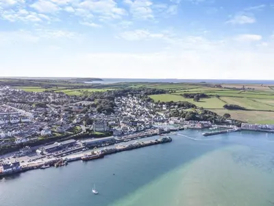 an aerial view of a town on the water at 5 Bed in Padstow oc-s29853 in Padstow