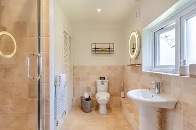 a bathroom with a toilet and a sink at 5 Bed in Bodmin oc-l29658 in Blisland