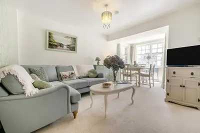 a living room with a couch and a table at 2 Bed in Trewoon oc-t29503 in St Austell