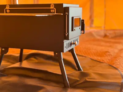 a camera on a tripod on a table at Furnished Bell Tent 3 in Carlyon Bay