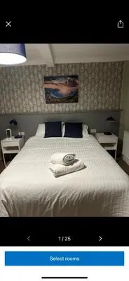 a picture of a bedroom with a bed with a towel on it at Kings head in Chacewater