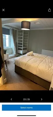 a bedroom with a large bed in a room at Kings head in Chacewater