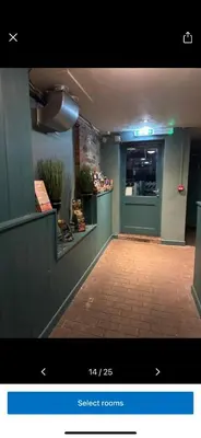 a picture of a restaurant with the door open at Kings head in Chacewater