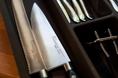 a knife and other utensils in a case at Manor Cottage at Cusgarne Manor, romantic, dog-friendly in Cusgarne