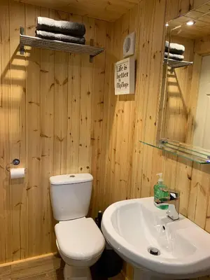 a bathroom with a toilet and a sink at The Lookout in Padstow