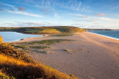 a view of a sandy beach with the ocean at 4 Bed in Porthleven oc-ch30536 in Porthleven