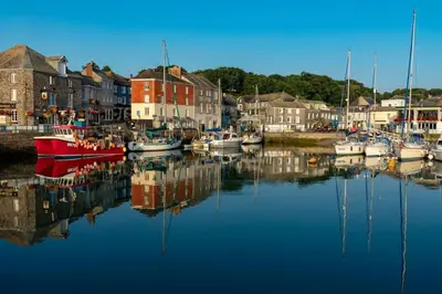 a group of boats are docked in a harbor at 2 Bed in St. Mawgan oc-l30651 in Saint Mawgan