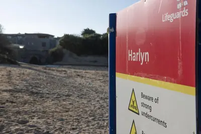 a sign on the side of a road at Harlyn Folly, Apartment 6, Harlyn in St Merryn