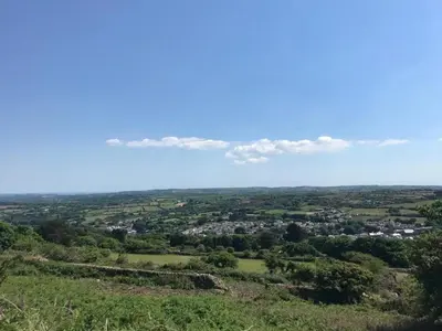 a view from the top of a hill at Honeysuckle Cabin in Redruth