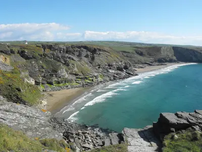 an aerial view of a beach on a cliff at Mews Cottage in Tintagel