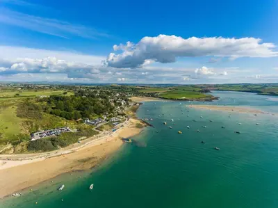 an aerial view of a beach with boats in the water at 3 Bed in Egloshayle oc-m32201 in Egloshayle