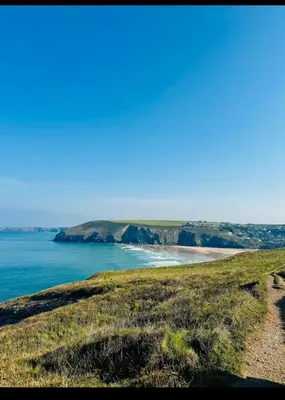 a view of the ocean and a beach at Glamping Pod in Mawgan Porth