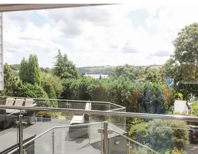 a view from the balcony of a house at Creek View House in Feock