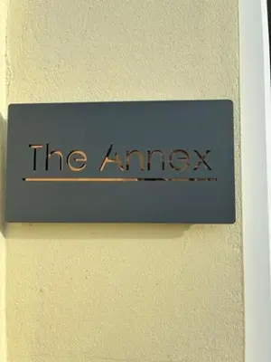 a sign on a wall that says the amax at Park Rd in Redruth
