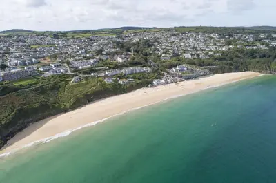 an aerial view of a beach and the ocean at Crystal View, Compass Point - Sea View - Free WiFi & Parking - Close to Beach in Carbis Bay