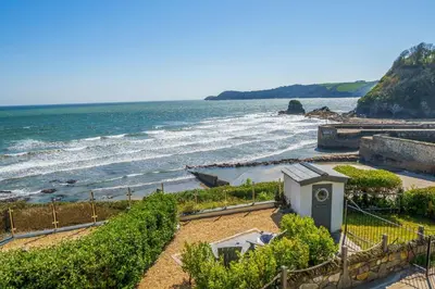 a view of a beach with the ocean at Lightkeepers Cottage in Charlestown