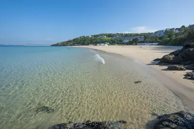 a view of a beach with the sand and water at Cloud 10, St Ives - Free WiFi - Free Parking - Pets Welcome - Sea Views in St Ives