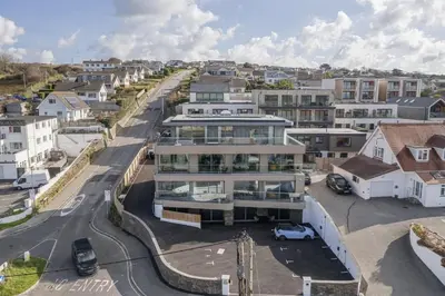 an aerial view of a house in a city at Apartment Balcony with Expansive Sea Views Parking in Newquay