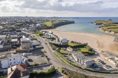 an aerial view of a beach with houses and the ocean at Apartment Balcony with Expansive Sea Views Parking in Newquay