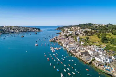 an aerial view of a harbor with boats in the water at Sundance Cottage Central Fowey with Sea Views in Fowey
