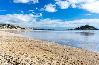 a view of the beach on a sunny day at Fourways near the golden sands of Marazion in Leedstown