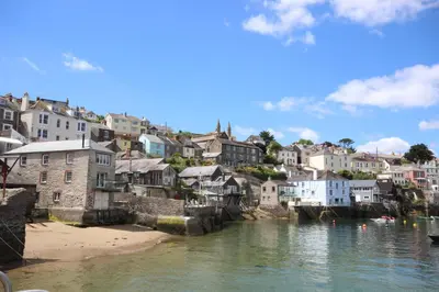 a view of a town with a river and houses at Rowan Retreat - sleeps 2 - Nr Looe and Polperro in Lanreath