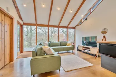 a living room with a couch and a television at 2 Bed in Tresarrett oc-b34255 in Blisland