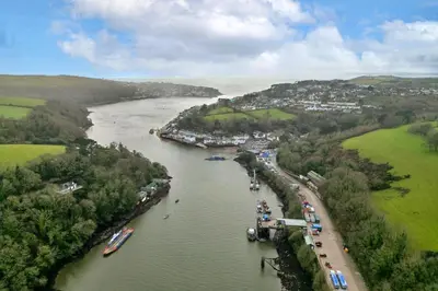 an aerial view of a river with boats in it at Finest Retreats - Bosuns Loft at Mixtow Creek in Lanteglos