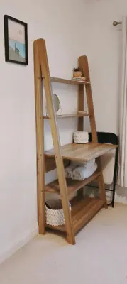 a wooden shelf in a corner of a room at Calm Private Room Near Truro - Short Stays Welcome in Kea