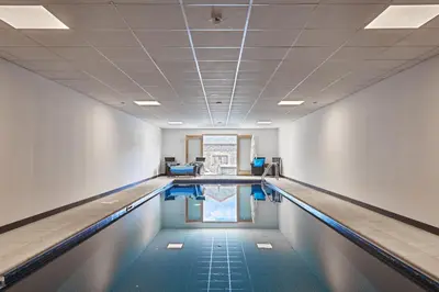 an empty swimming pool in a building at The Vineyard in Fowey