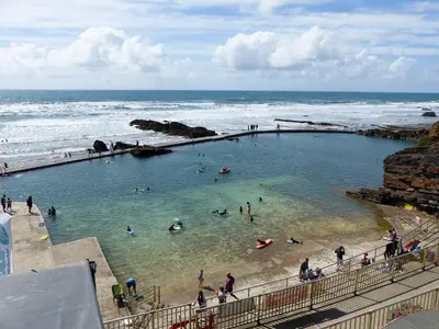 people swimming in a swimming pool at the beach at Beckaveans Stable in Jacobstow