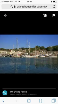 a picture of a harbor with boats in the water at Drang house all rooms have stairs in Padstow